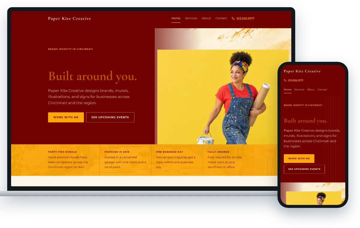 The Bold Creative design, shown on a laptop and a phone